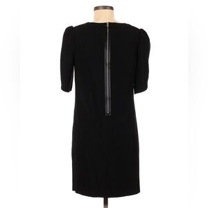 Black Cynthia Steffe Dress. Short sleeve, tulip sleeve, gold zipper. Sz10